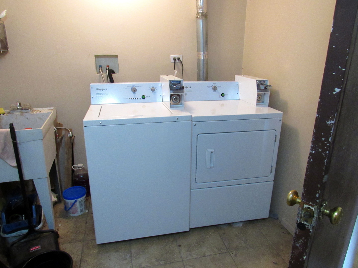 1156 Copperfield Lane, Unit C Schaumburg, IL 60193 - Photo 12 of 12 a utility room with dryer and washer