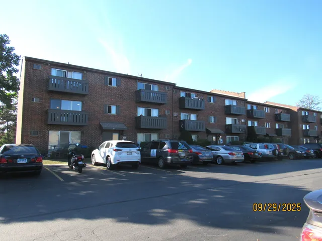 a cars parked in front of a building
