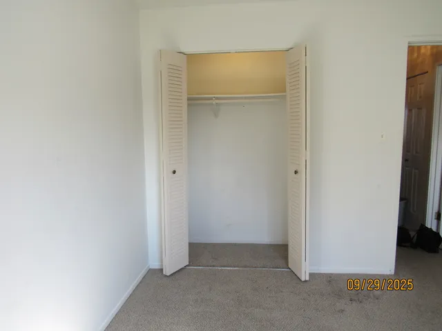 an empty room with closet