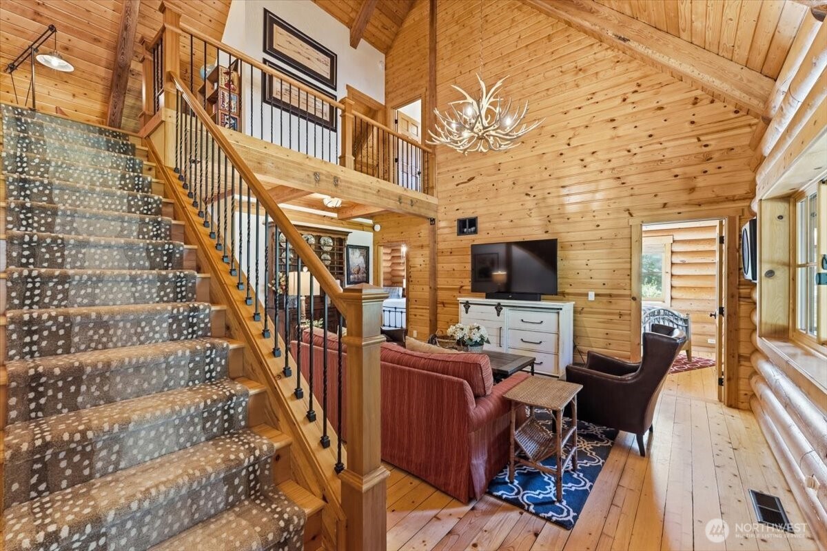 2250 First Crk Road Chelan, WA 98816 - Photo 23 of 39 a view of a livingroom with furniture and a flat screen tv