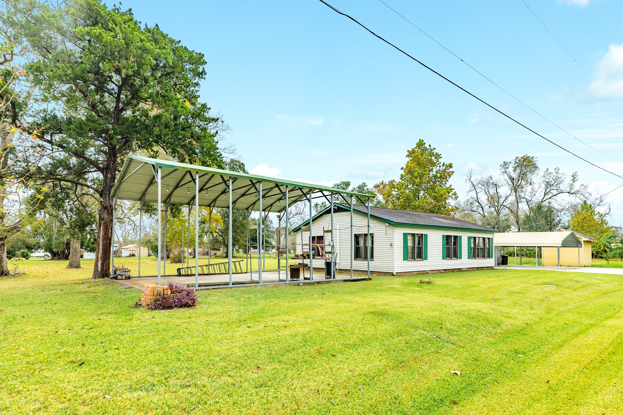 404 Chestnut Street Brazoria, TX 77422 - Photo 27 of 30 a view of a house with a swimming pool