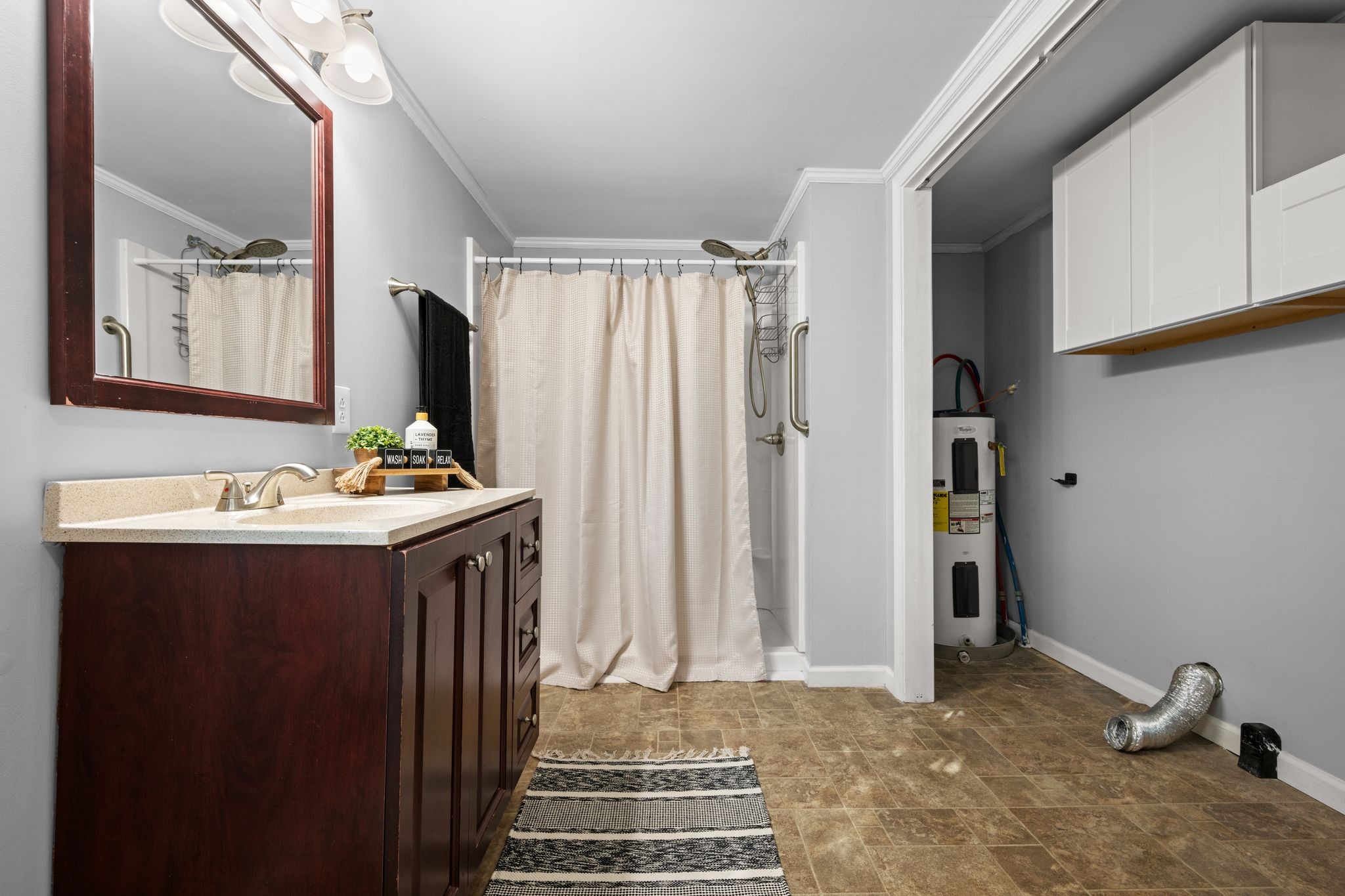 1105 Taylortown Road White Bluff, TN 37187 - Photo 19 of 27 a bathroom with a sink and a mirror