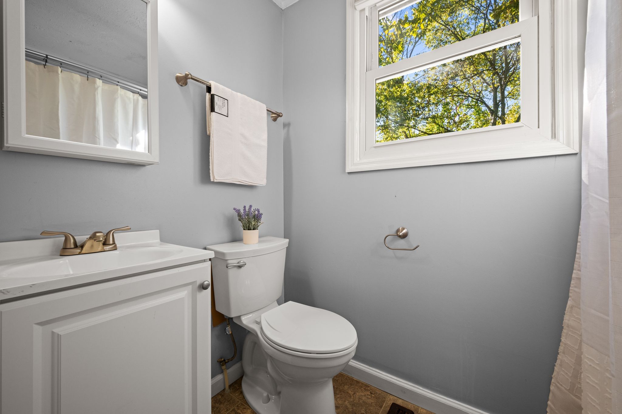 1105 Taylortown Road White Bluff, TN 37187 - Photo 22 of 27 a view of bathroom with a sink and a toilet