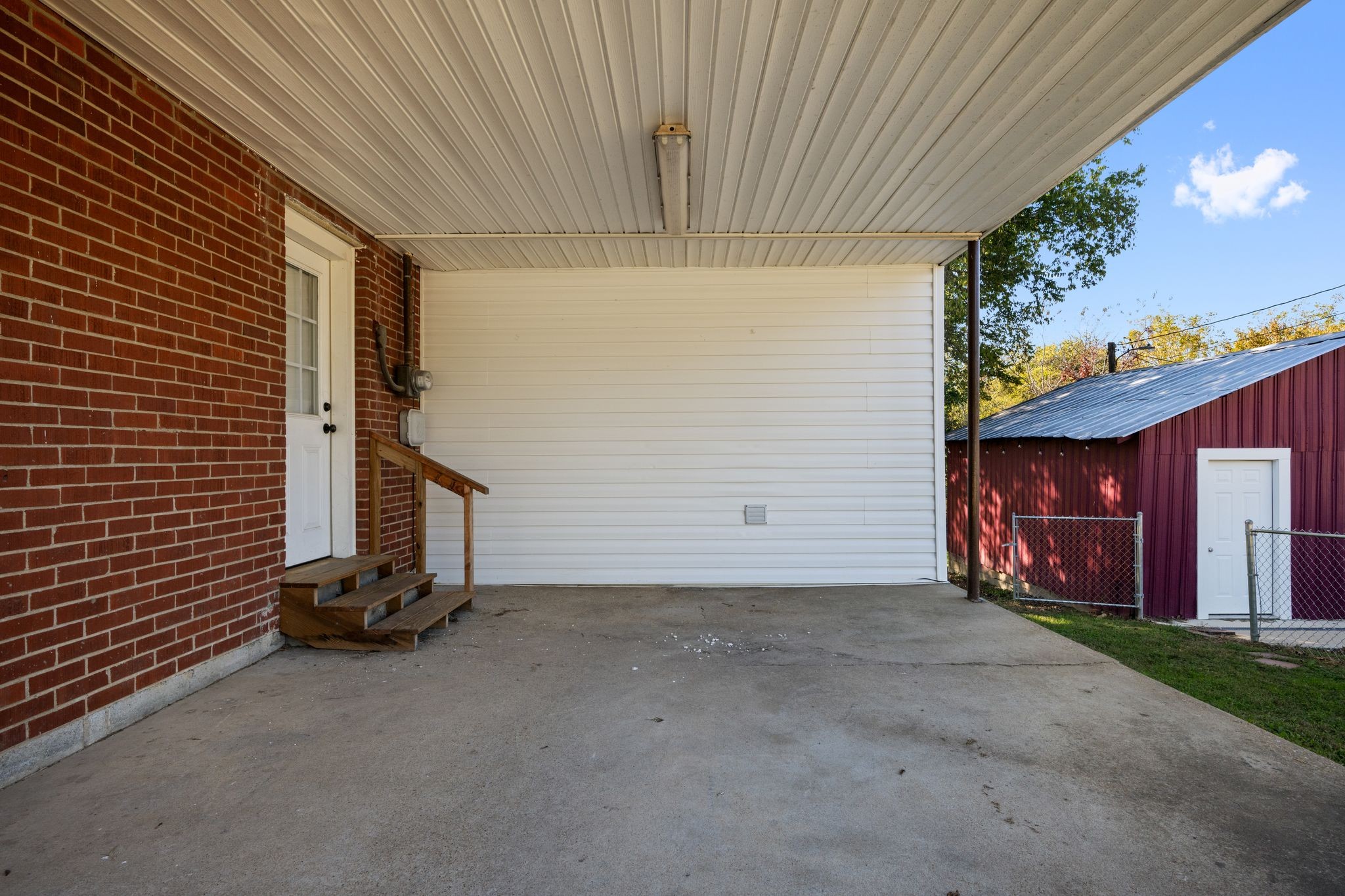 1105 Taylortown Road White Bluff, TN 37187 - Photo 5 of 27 a view of a room with gym equipment and a window