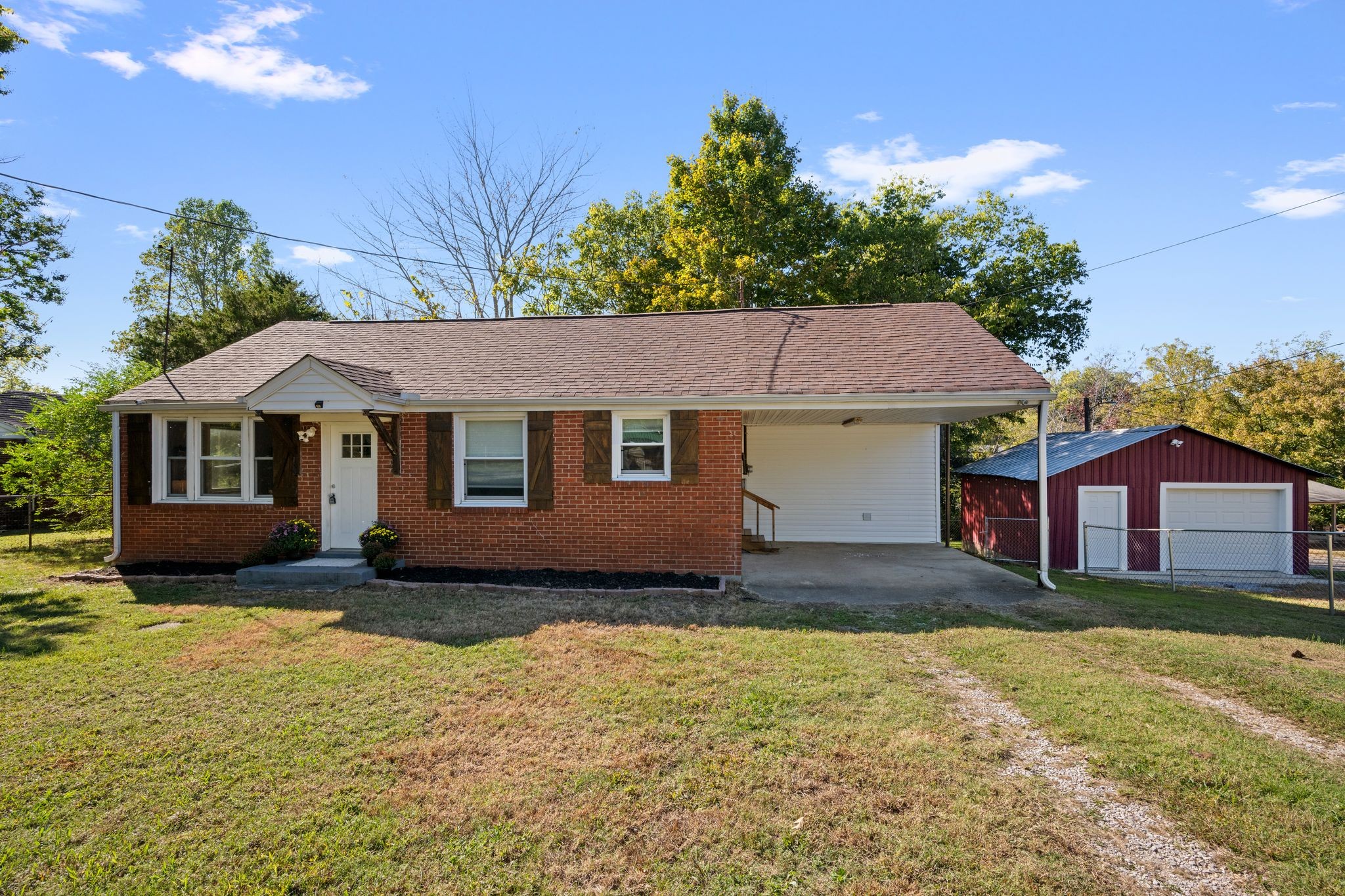 1105 Taylortown Road White Bluff, TN 37187 - Photo 6 of 27 a front view of a house with a yard