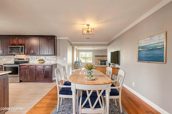 a view of a dining room with furniture
