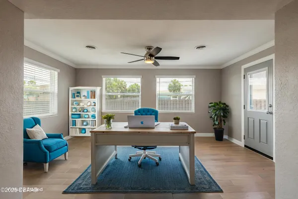 a living room with furniture and window