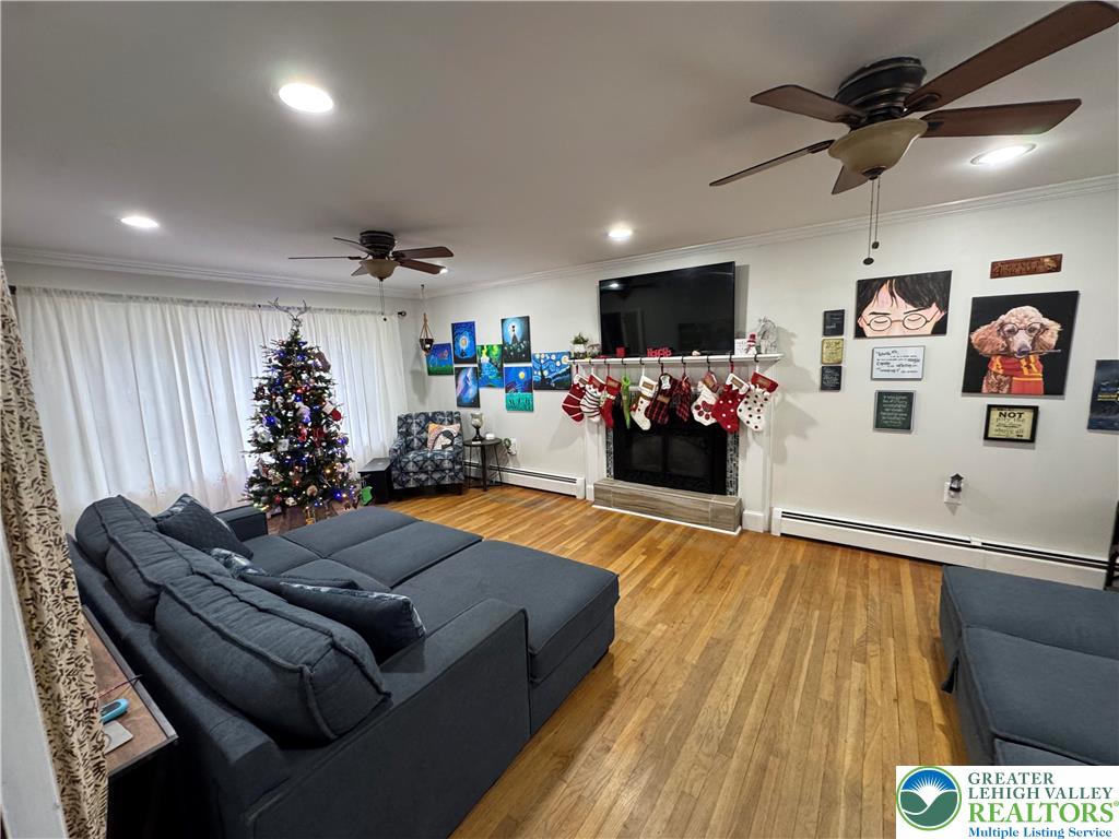717 Liberty Street Emmaus, PA 18049 - Photo 14 of 35 a living room with furniture and a flat screen tv