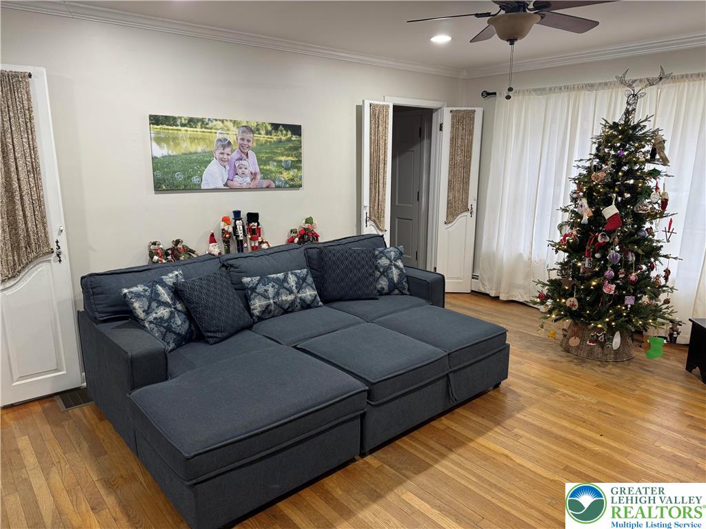 717 Liberty Street Emmaus, PA 18049 - Photo 15 of 35 a living room with furniture plant and a window
