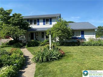 717 Liberty Street Emmaus, PA 18049 - Photo 2 of 35 a front view of house with yard and green space