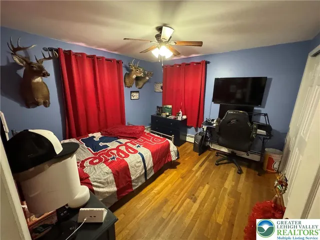 a bedroom with a bed and a closet