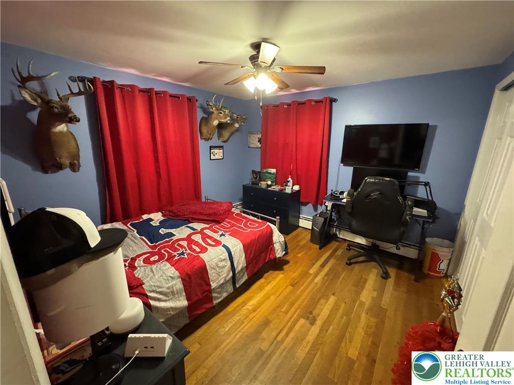 717 Liberty Street Emmaus, PA 18049 - Photo 25 of 35 a bedroom with a bed and a closet