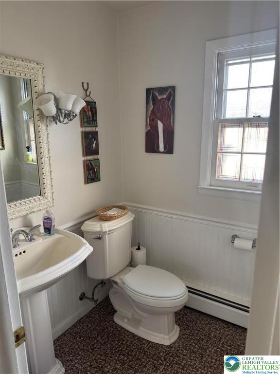 717 Liberty Street Emmaus, PA 18049 - Photo 27 of 35 a white toilet sitting next to a bathroom sink