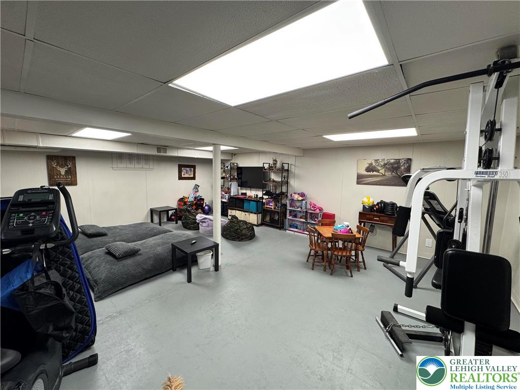 717 Liberty Street Emmaus, PA 18049 - Photo 31 of 35 a living room with furniture and gym equipment