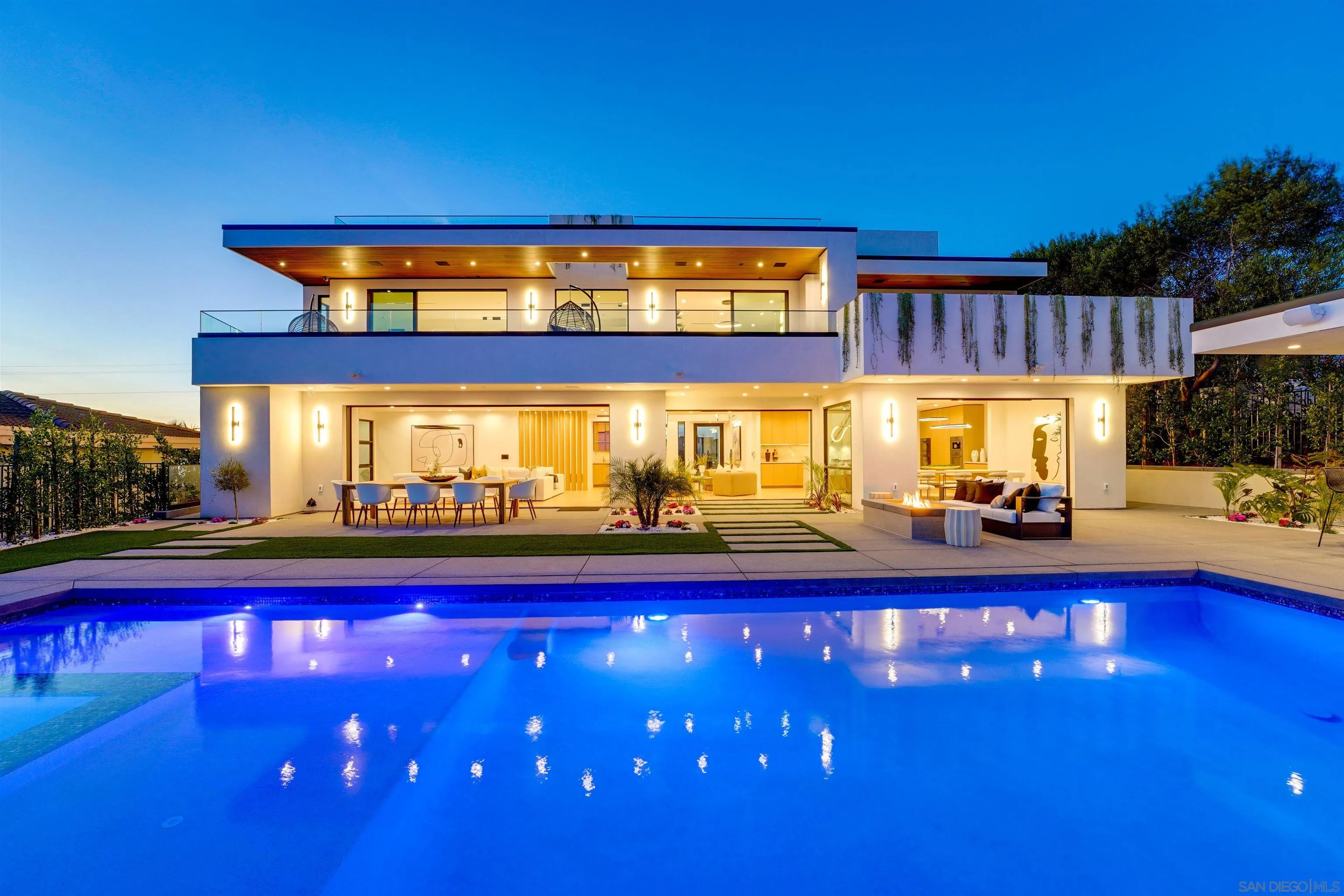 a view of swimming pool with outdoor seating
