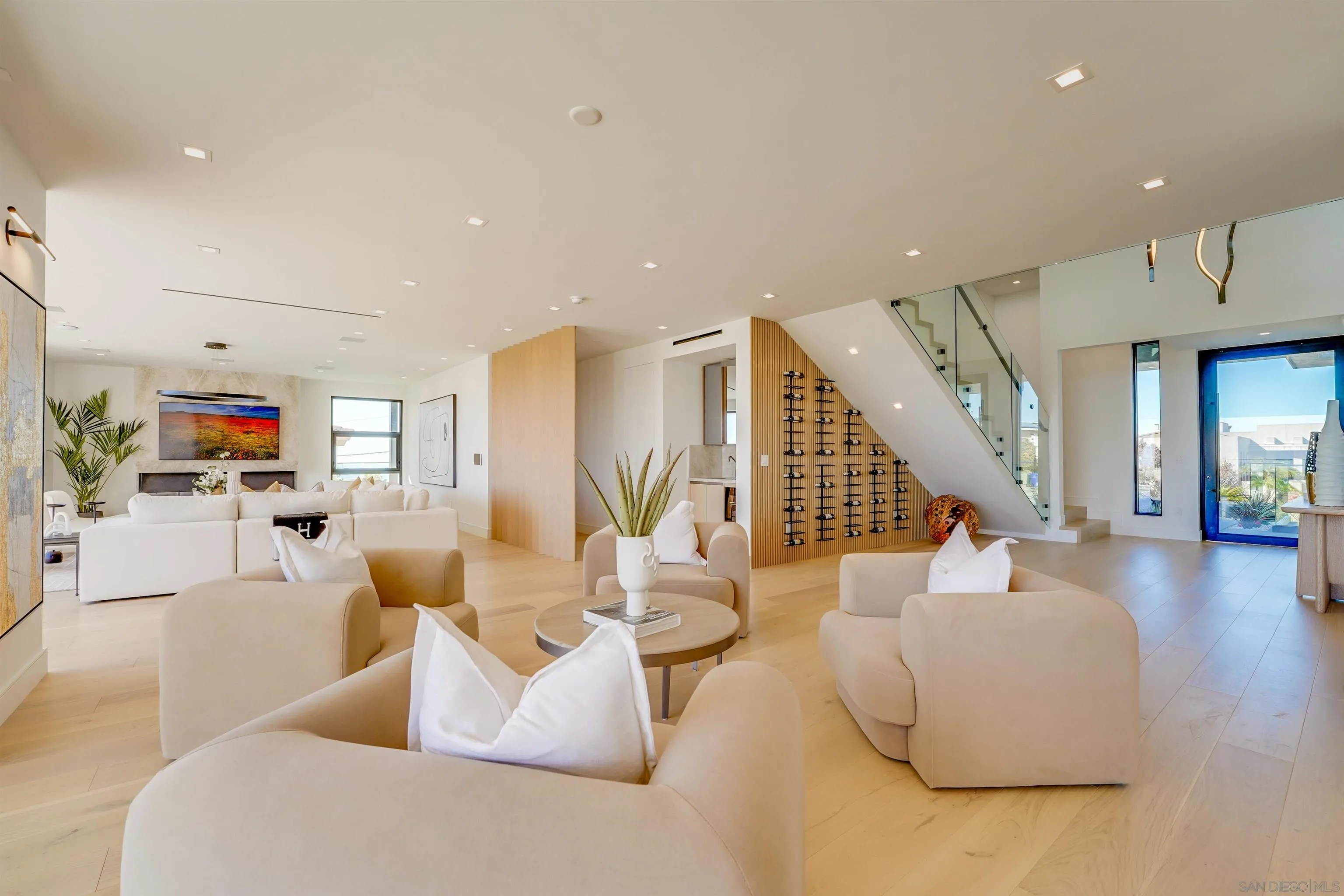 1205 La Jolla Rancho Road La Jolla, CA 92037 - Photo 13 of 75 a living room with furniture and wooden floor