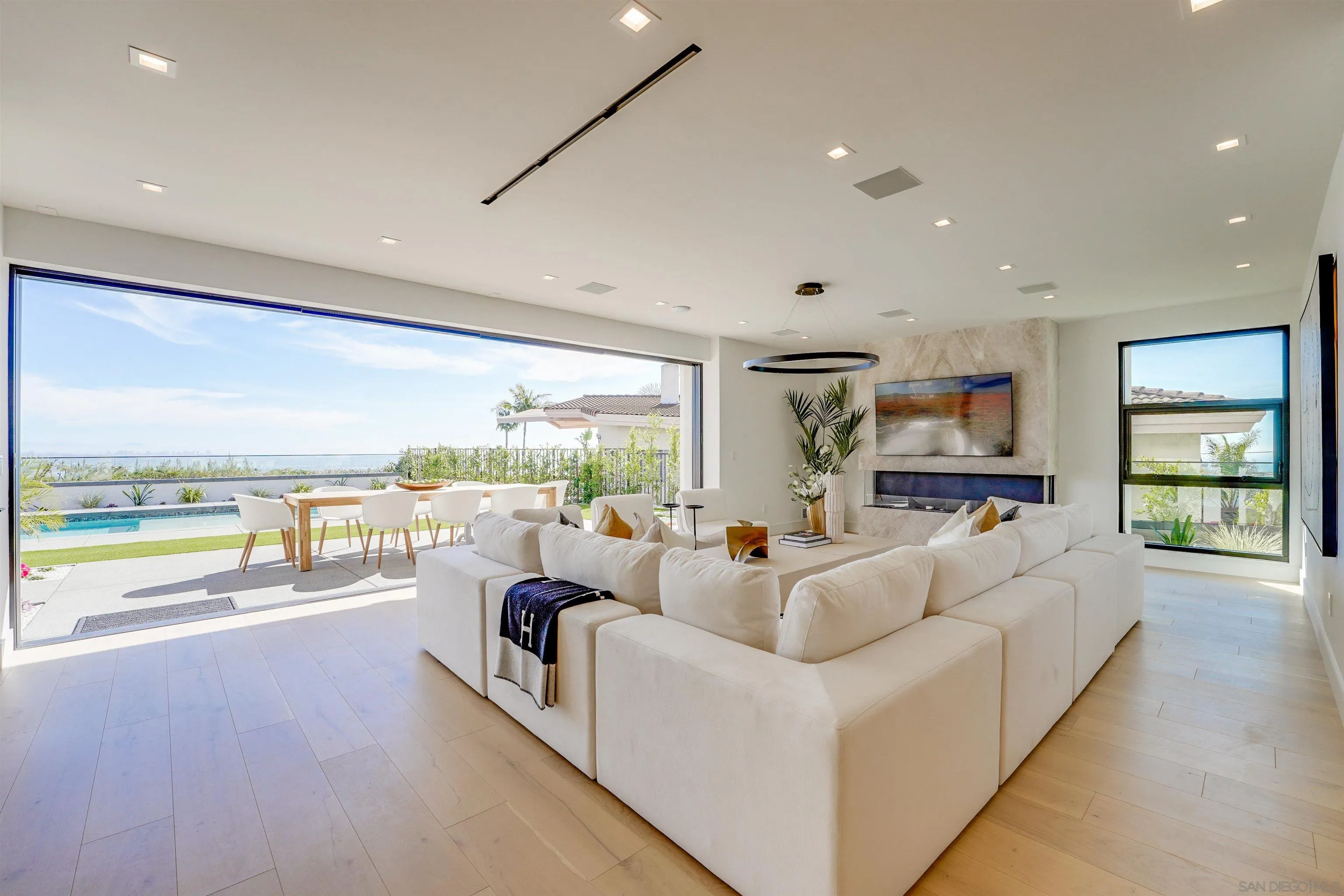 1205 La Jolla Rancho Road La Jolla, CA 92037 - Photo 14 of 75 a living room with furniture and a large window