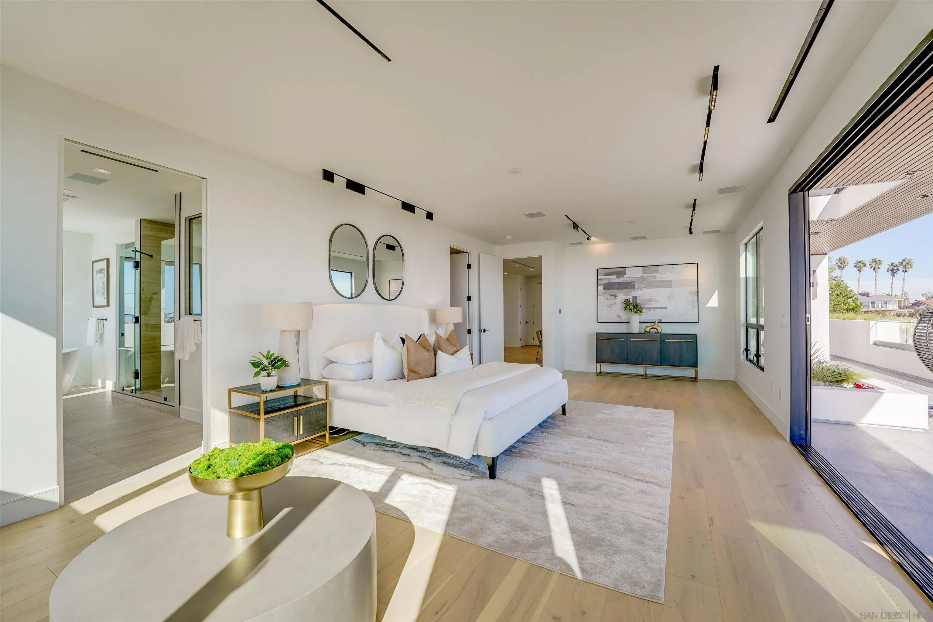 1205 La Jolla Rancho Road La Jolla, CA 92037 - Photo 39 of 75 a living room with furniture fireplace and a large window