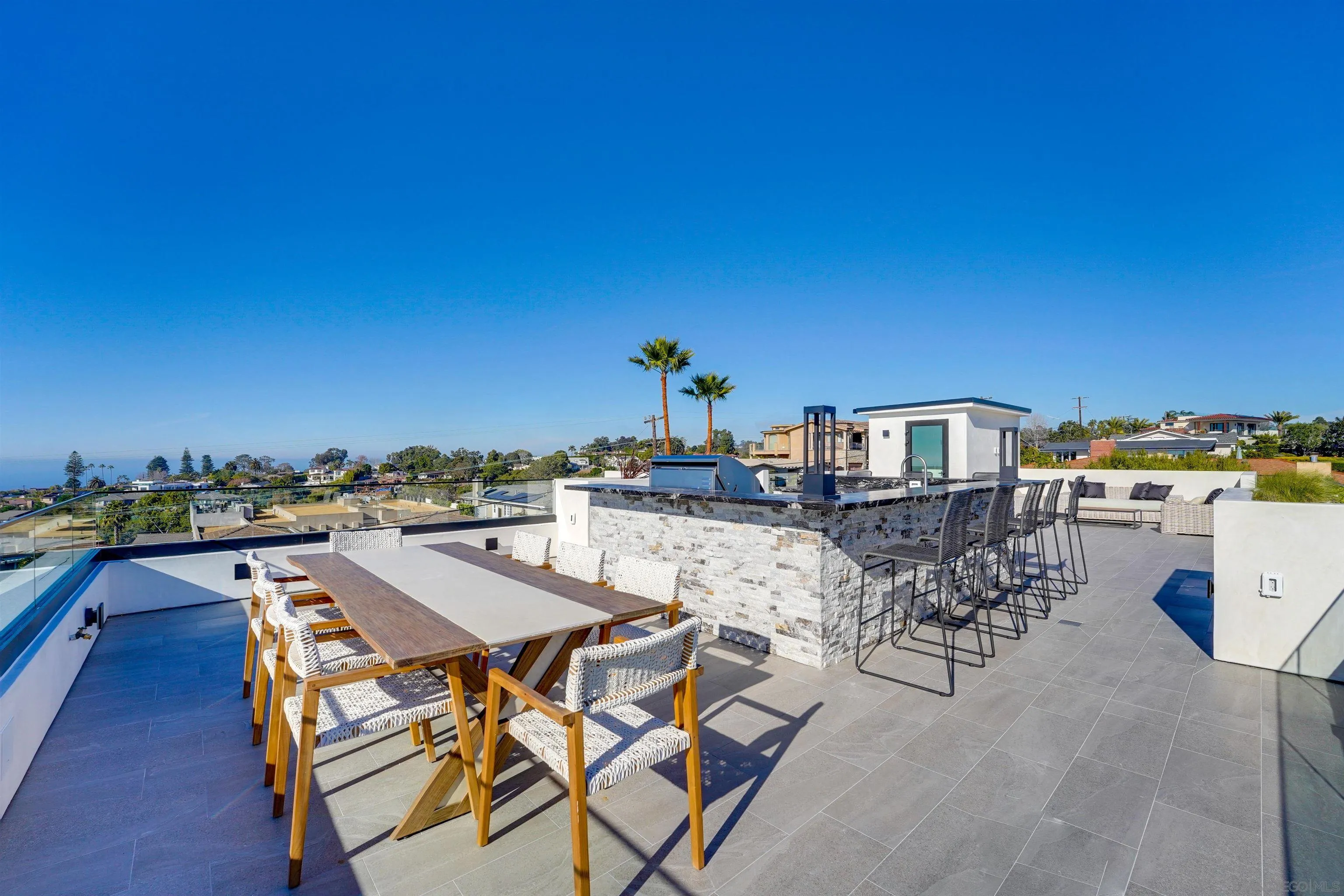 1205 La Jolla Rancho Road La Jolla, CA 92037 - Photo 50 of 75 a view of a terrace with furniture and city view