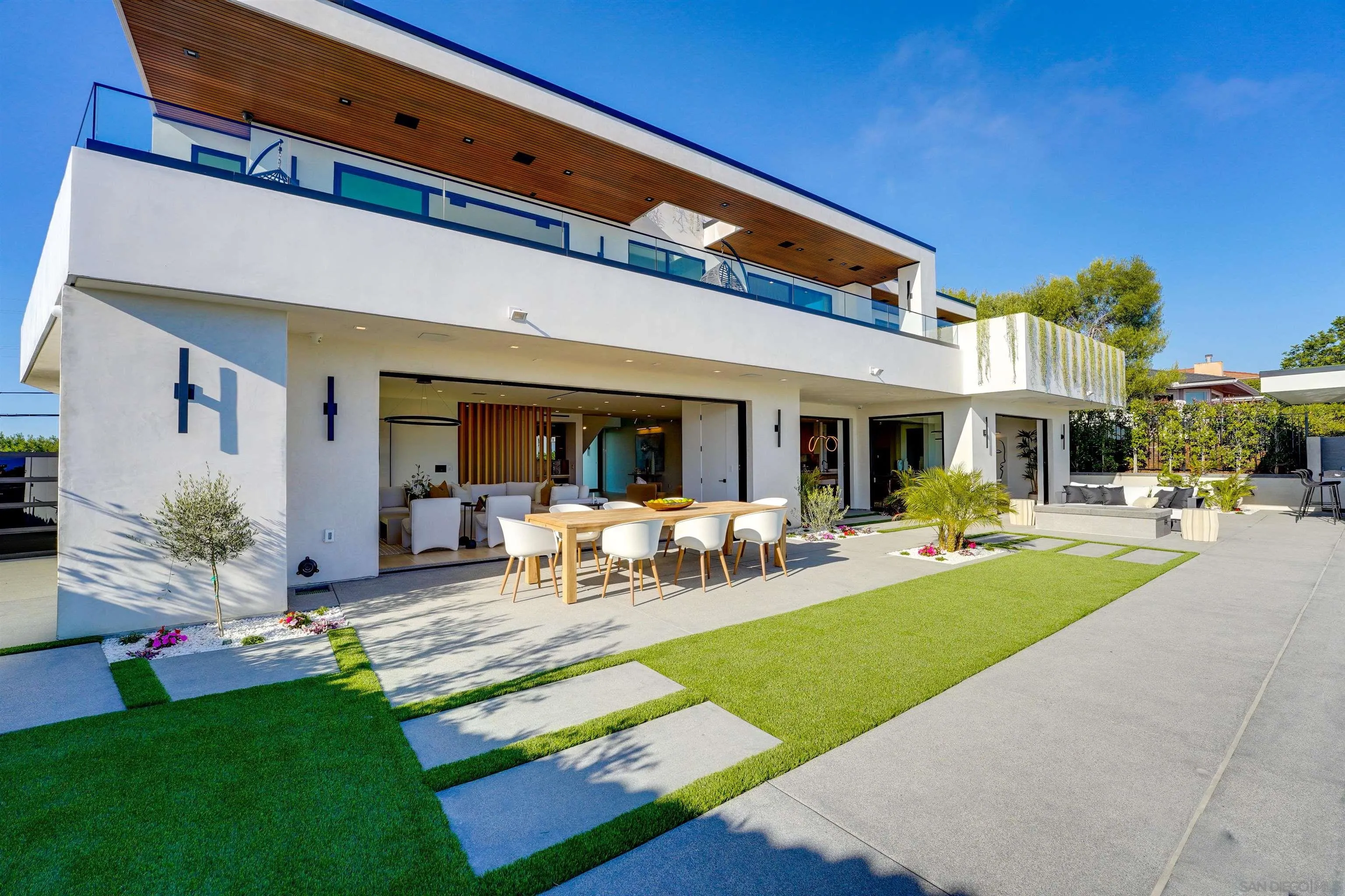 1205 La Jolla Rancho Road La Jolla, CA 92037 - Photo 53 of 75 a view of a house with swimming pool and sitting area