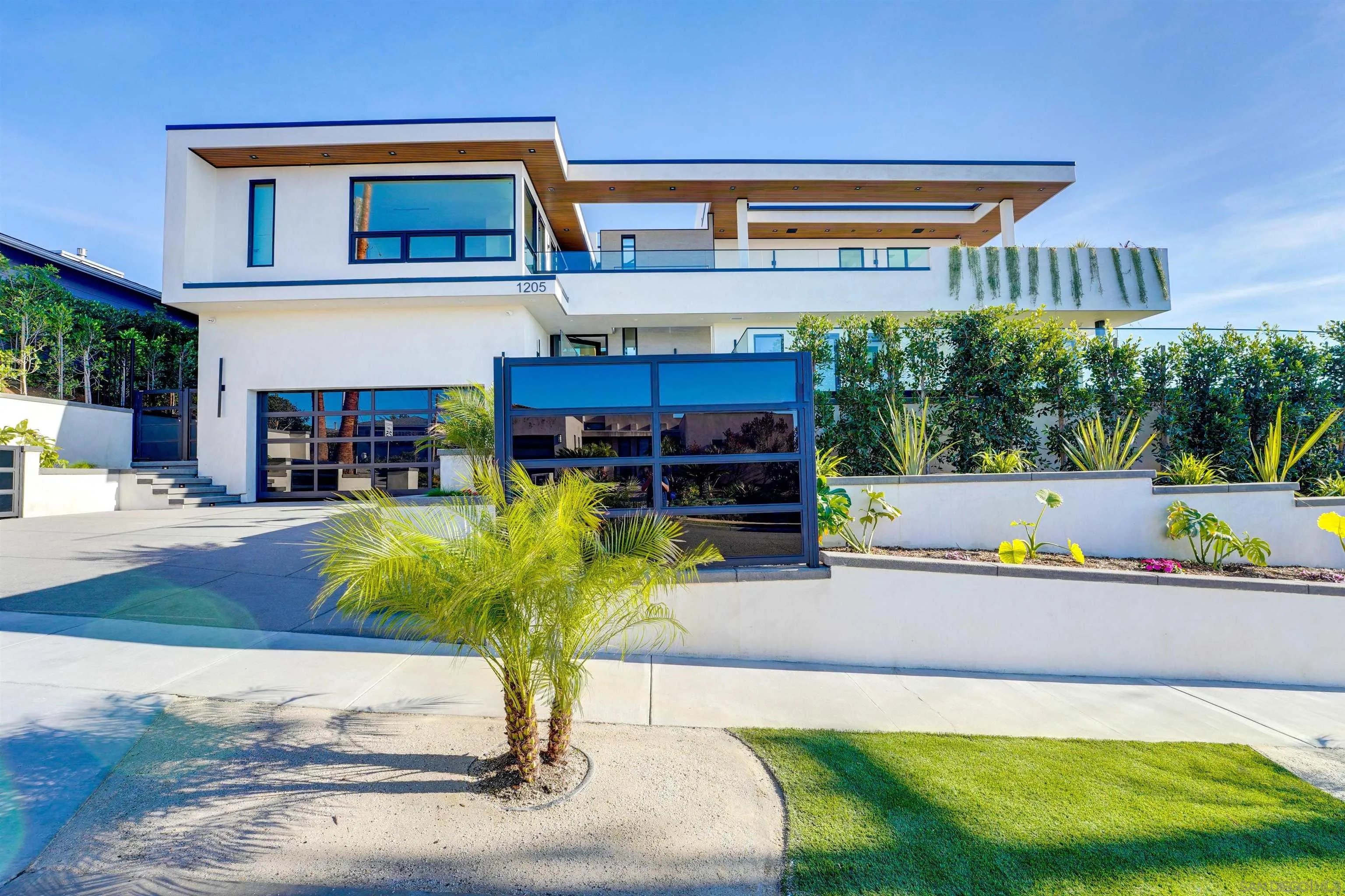 1205 La Jolla Rancho Road La Jolla, CA 92037 - Photo 58 of 75 a swimming pool with outdoor seating and yard