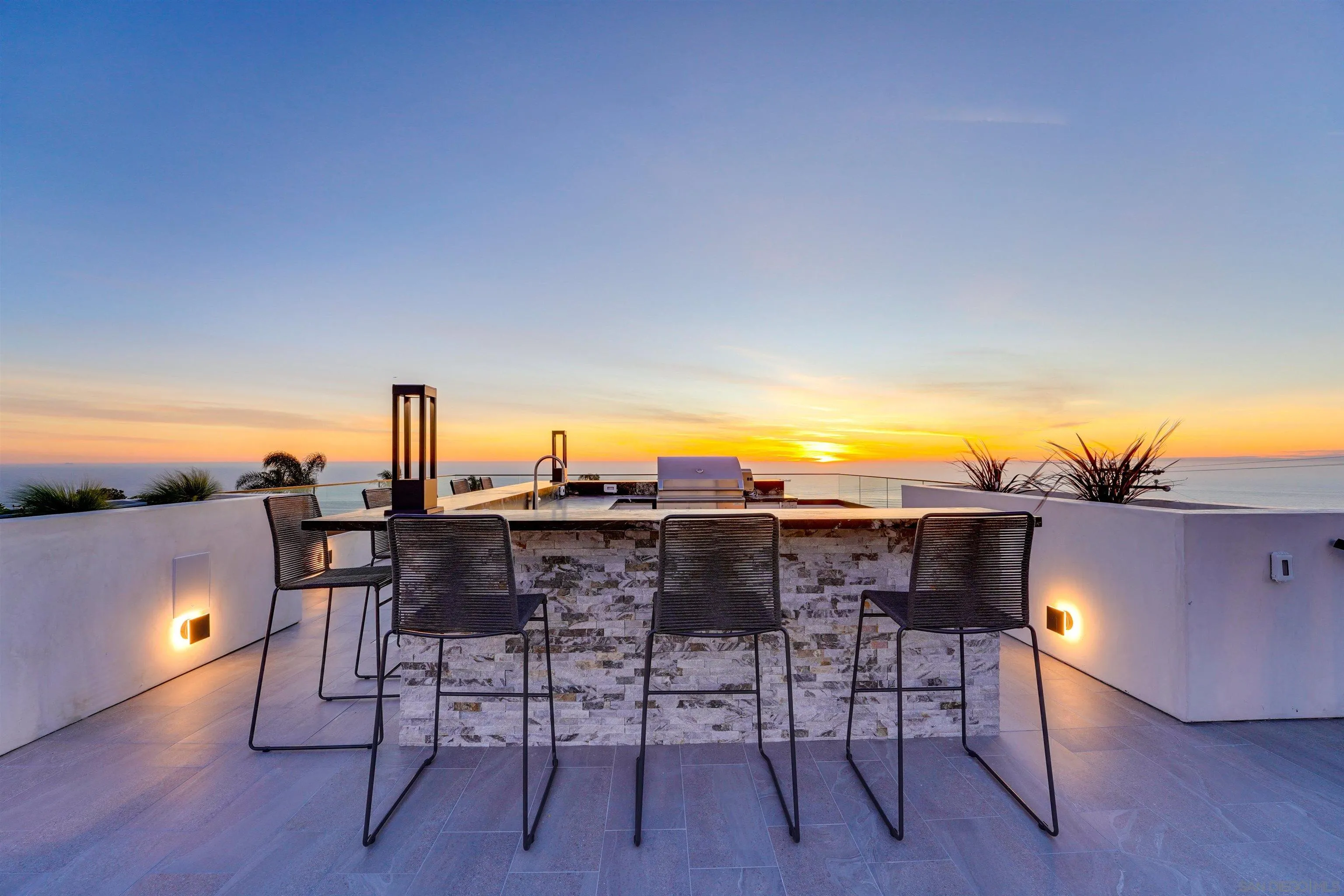 1205 La Jolla Rancho Road La Jolla, CA 92037 - Photo 64 of 75 a view of a chairs and table on the terrace