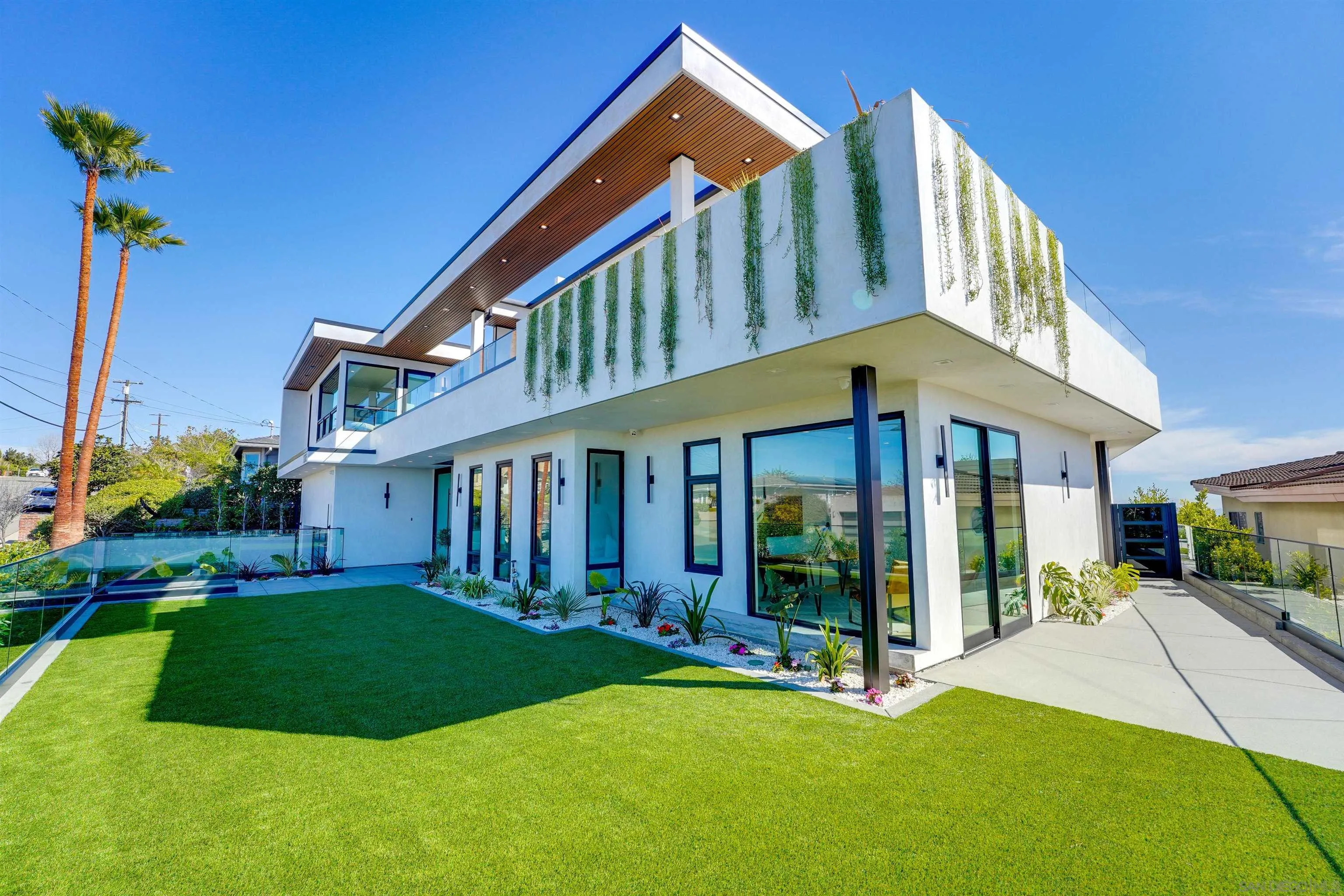 1205 La Jolla Rancho Road La Jolla, CA 92037 - Photo 7 of 75 a view of an house with backyard porch and sitting area