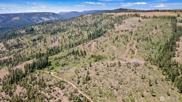 a view of a lake with mountains in the background