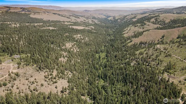 a view of a lake with mountains in the background