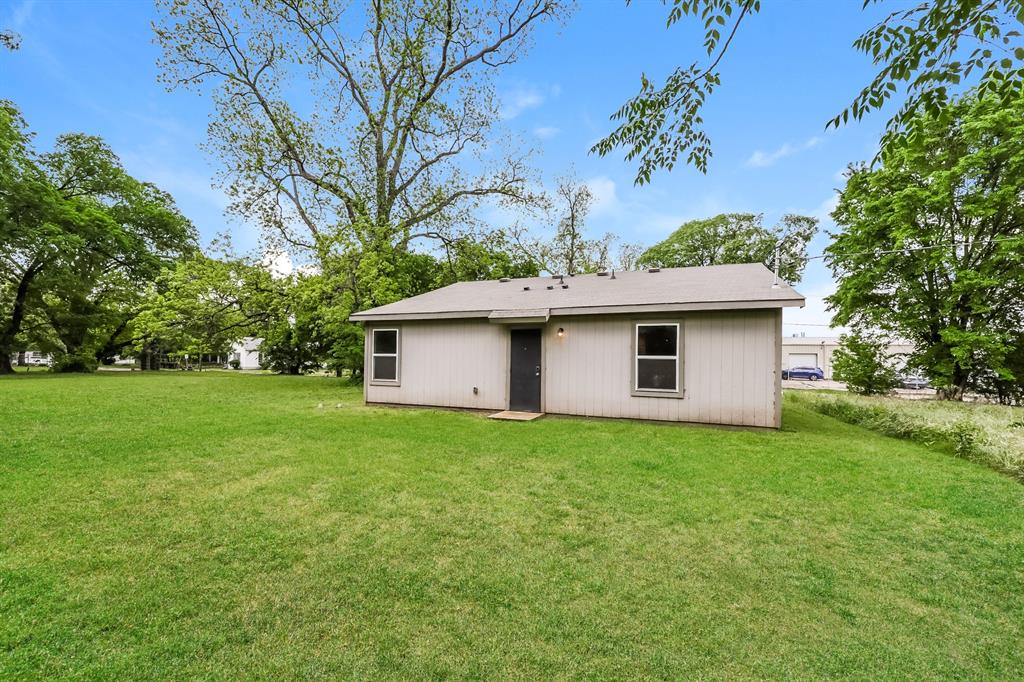609 Sherman Street Waco, TX 76704 - Photo 21 of 21 a view of a house with a yard