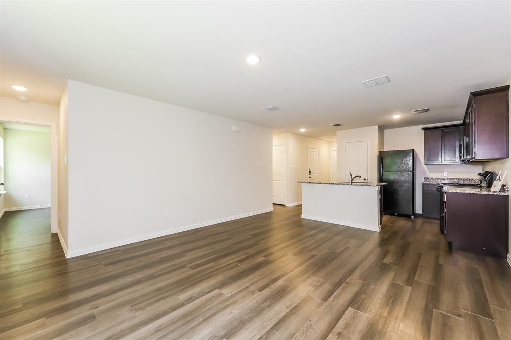 609 Sherman Street Waco, TX 76704 - Photo 6 of 21 a view of kitchen with wooden floor