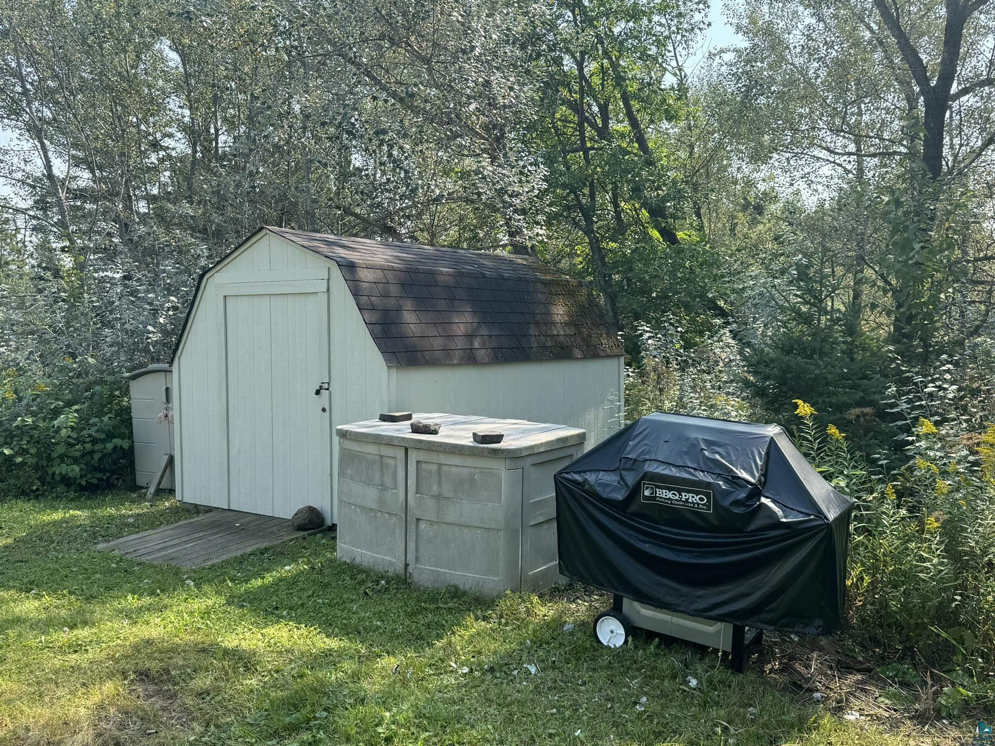 840 Stanley Road Two Harbors, MN 55616 - Photo 13 of 14 View of outbuilding featuring a lawn