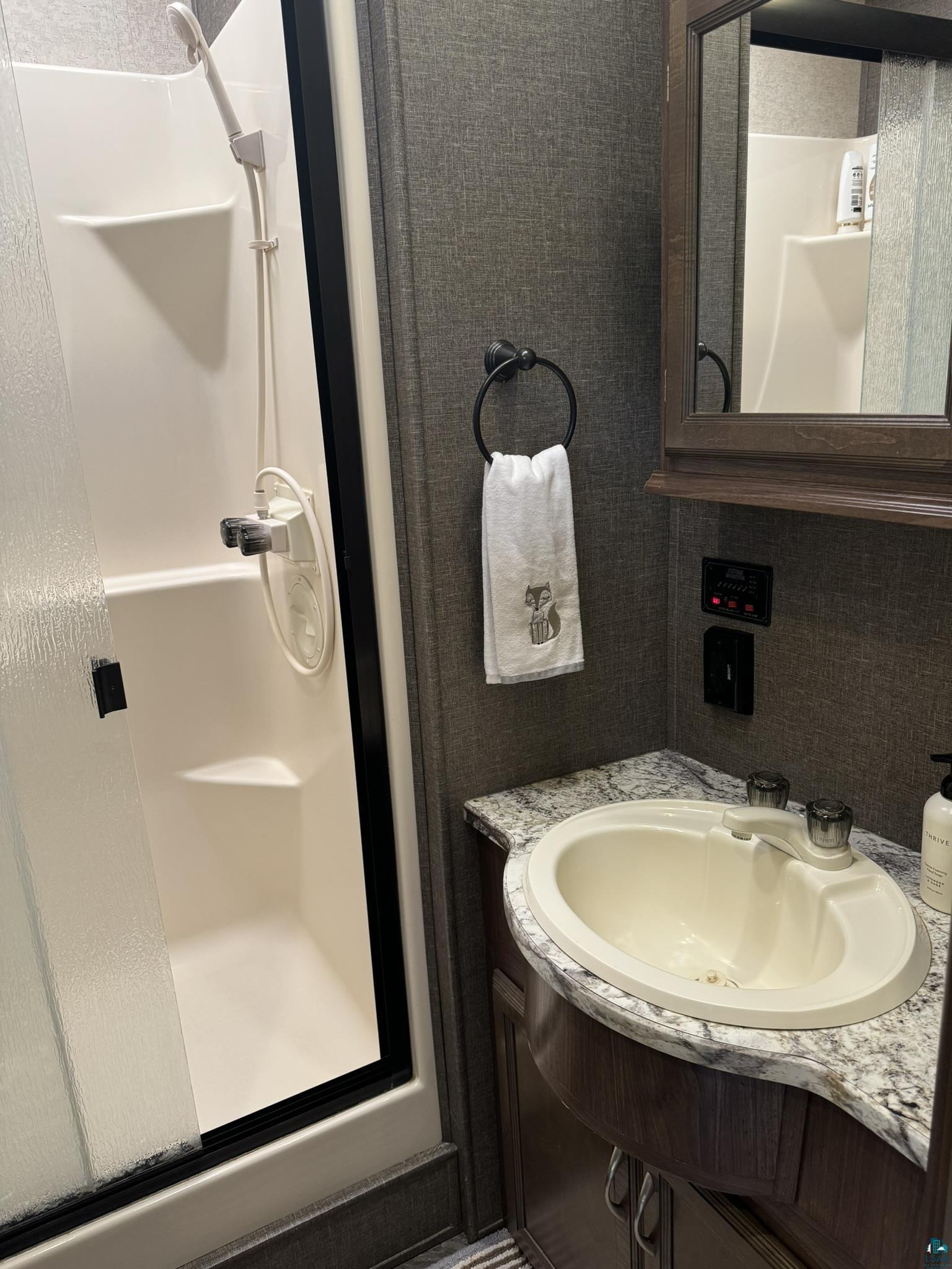 840 Stanley Road Two Harbors, MN 55616 - Photo 5 of 14 Bathroom with vanity and walk in shower