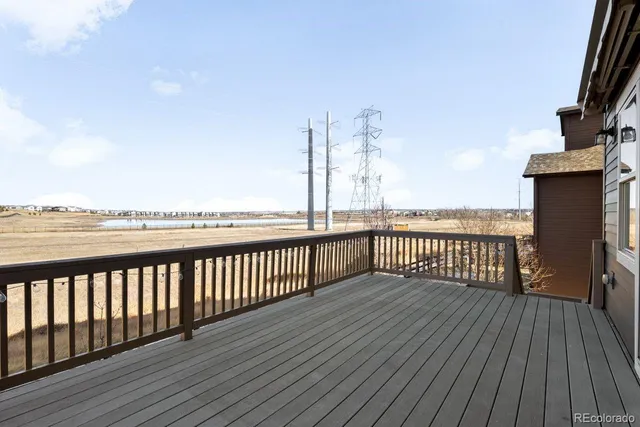 a front view of a house with a garage and a fireplace