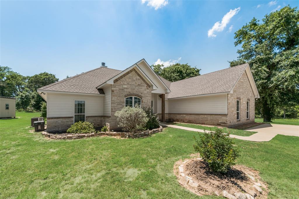 a front view of house with yard