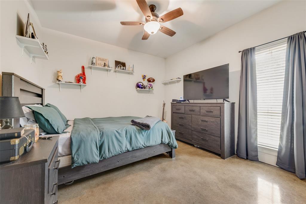 4320 Highway 198 Canton, TX 75103 - Photo 15 of 26 a bedroom with a bed and a flat tv screen on dresser
