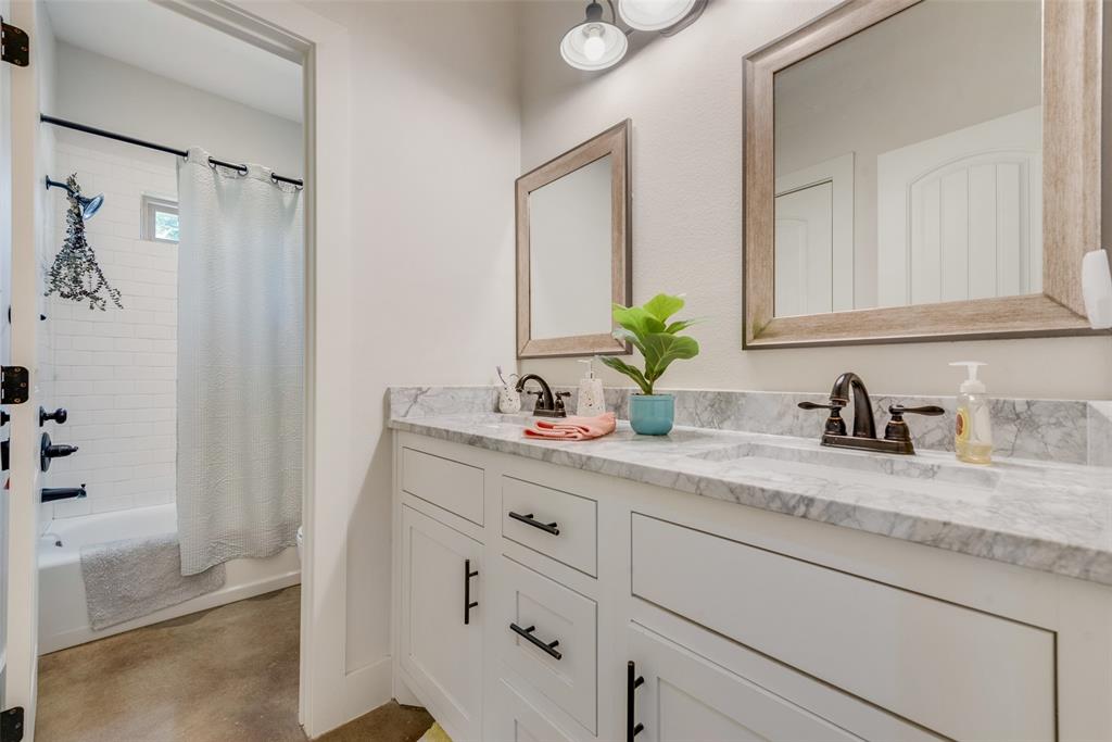 4320 Highway 198 Canton, TX 75103 - Photo 16 of 26 a bathroom with a granite countertop sink and a mirror