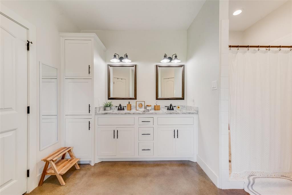 4320 Highway 198 Canton, TX 75103 - Photo 18 of 26 a spacious bathroom with a double vanity sink mirror and