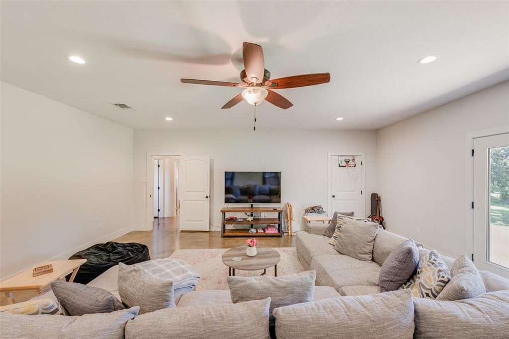 4320 Highway 198 Canton, TX 75103 - Photo 20 of 26 a living room with furniture and a flat screen tv