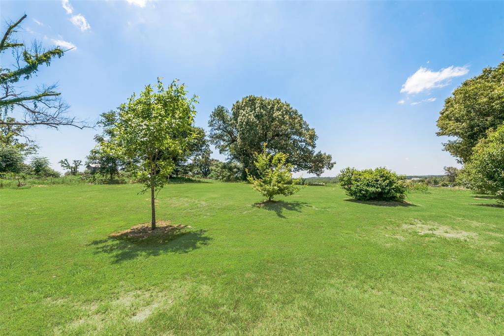 4320 Highway 198 Canton, TX 75103 - Photo 22 of 26 a backyard of a house with lots of green space
