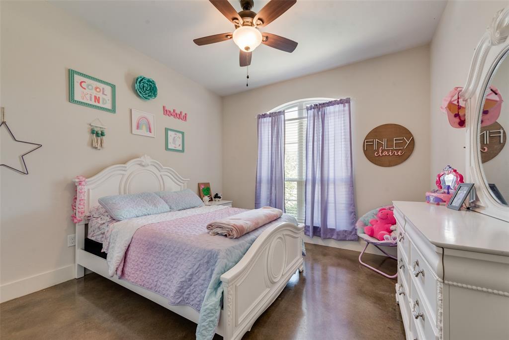4320 Highway 198 Canton, TX 75103 - Photo 26 of 26 a bedroom with a bed and a chandelier