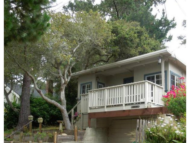 a balcony view with a garden space