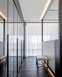 a view of front door with wooden floor