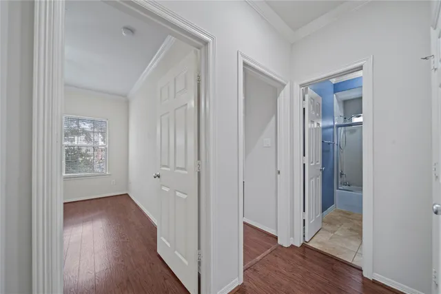 a view of entryway with wooden floor