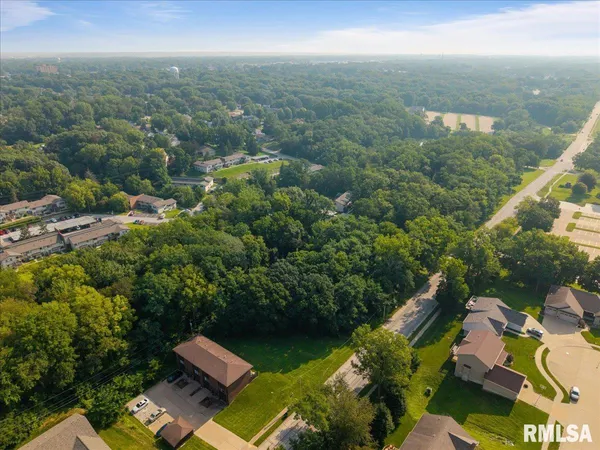 an aerial view of residential house with outdoor space