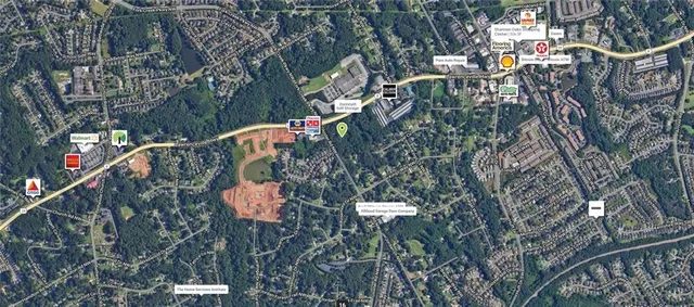 a view of swimming pool with a patio and garden