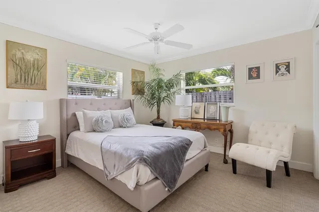 a bedroom with a bed and a couch