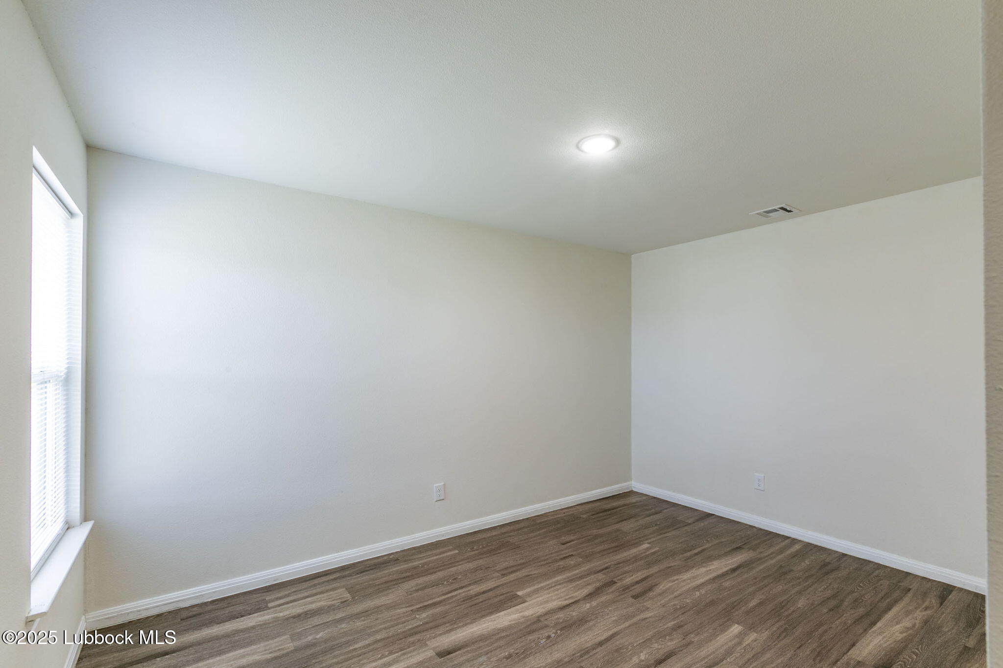 1714 East Cornell Street Lubbock, TX 79403 - Photo 7 of 18 a view of an empty room