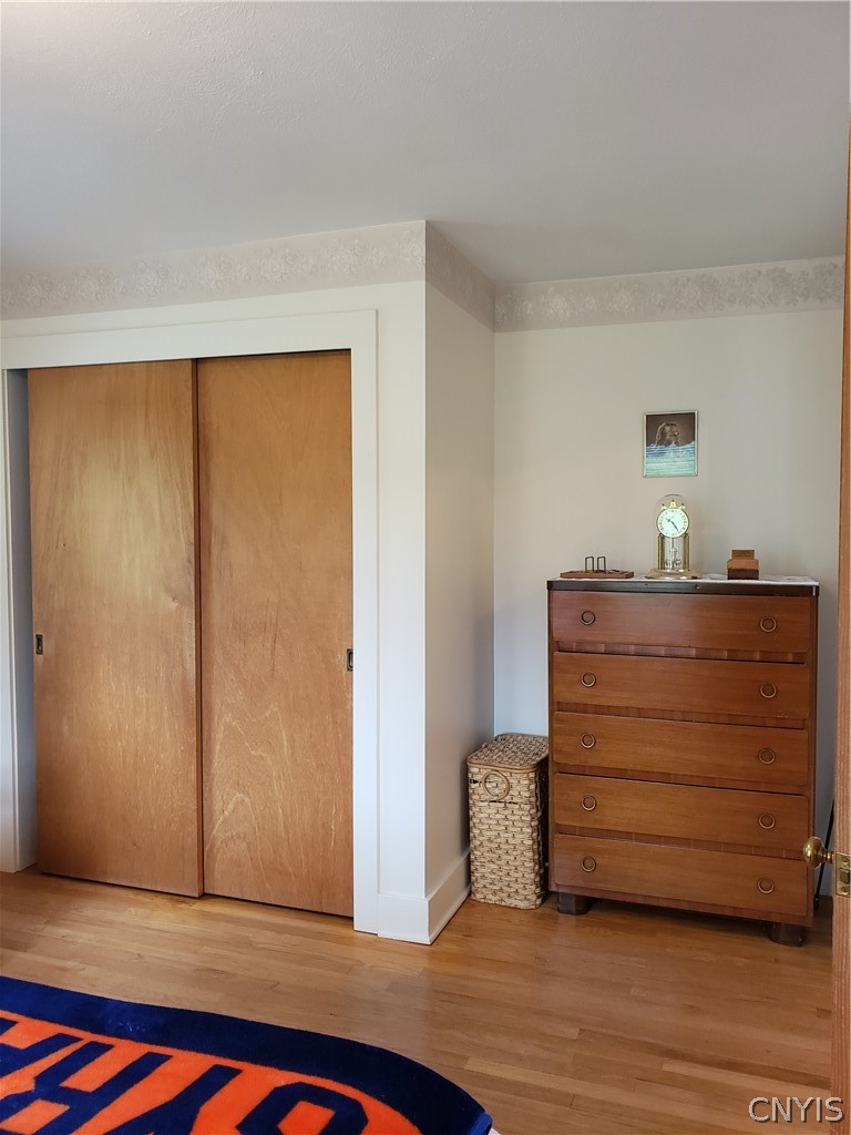 3744 Fisher Road Skaneateles, NY 13152 - Photo 11 of 18 hardwood floors through bedrooms