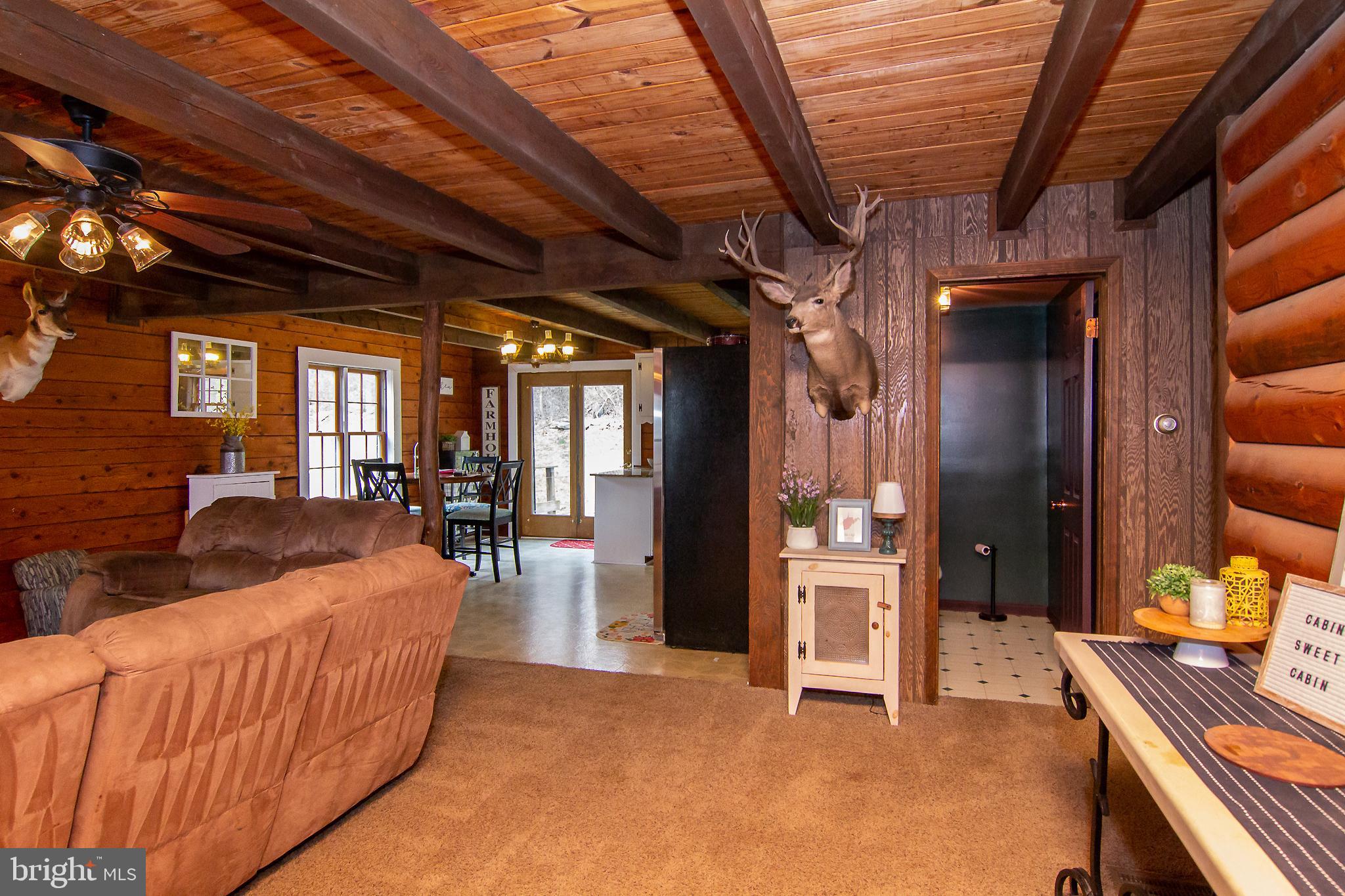 950 Green Springs Road Hanover, PA 17331 - Photo 15 of 42 Exposed wood beams and log walls throughout